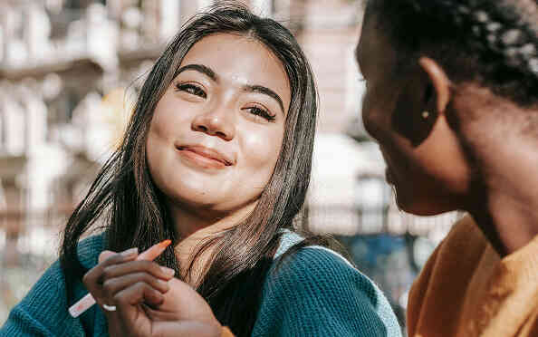 woman talking to other woman